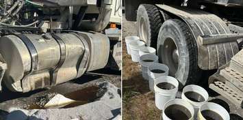 Sarnia Fire Rescue crews contain a leak of hydraulic fluid after a transport crash - Oct. 21/25 (Photo courtesy of Sarnia Fire Rescue via Facebook)